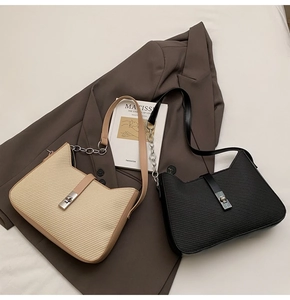 Detailed close-up of woven texture and metal twist lock on chic shoulder bags