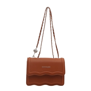Brown lacy flap shoulder bag with silver chain strap and wavy edge design in lychee leather