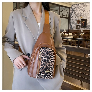 Leopard print crossbody bag shown on model highlighting its capacity and casual style