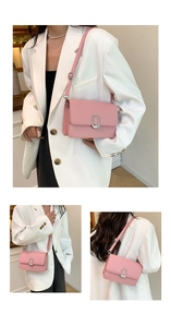 Detailed views of a pink leather crossbody bag with silver buckle and adjustable strap
