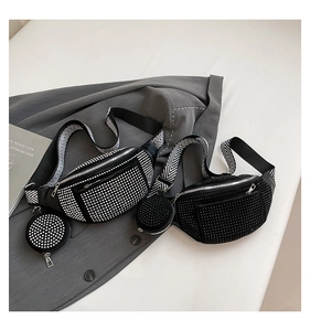Detail of rhinestone fanny packs with wide geometric straps and mini round pouches