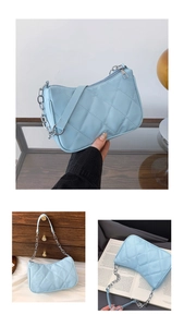 Multiple views of light blue quilted underarm bag with silver chain and leather strap
