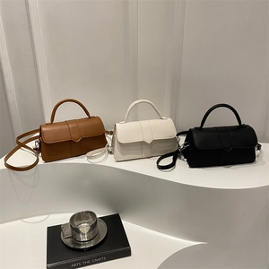 Minimalist square crossbody bags in brown, white and black with arrow stitching