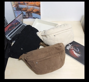 Corduroy crossbody bags in black, beige, and brown colors with a velvet stripe texture