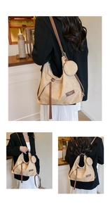 Detail of khaki hobo tote bag featuring small coin purse and brown leather accents