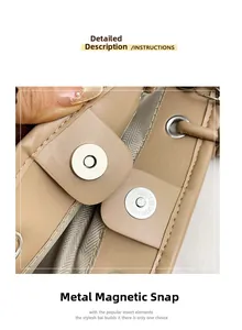 Close-up of metal magnetic snap closure on khaki woven bucket bag with lining