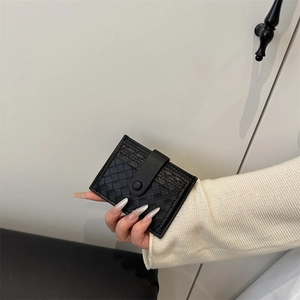 Handheld black woven leather card holder wallet with snap button closure for women