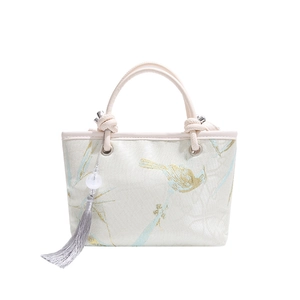 New Chinese style embroidered silk bucket bag with gold bird motifs and silk tassel