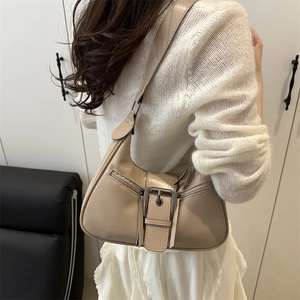 Minimalist beige PU leather hobo bag with wide buckle and side zipper detail for women