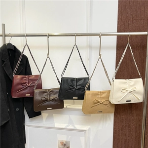 Minimalist chain shoulder bags with bow decoration in five colors and faux leather texture