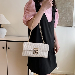Chic beige woven flap shoulder bag with gold geometric buckle and chain strap