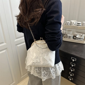 Elegant white lace handbag with butterfly embroidery and golden chain strap