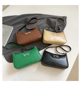 Chic baguette bags in four colors featuring golden bow accents and premium leather texture