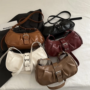 Vintage pleated crescent shoulder bags in five colors with metallic buckle details