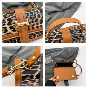 Detail view of leopard print handbag featuring magnetic gold clasp and premium leather straps