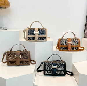 Chic leopard print crossbody bags in four colors with H-buckle and top handles