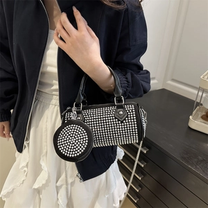 Chic black cylinder handbag with silver studs, chain strap and matching coin purse