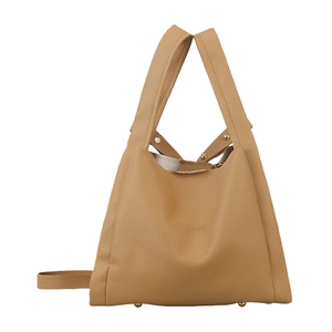 Structured beige pebble leather tote with unique folded design and fashion-themed engraving