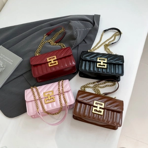 Quilted leather crossbody bags with gold metal clasps in red, black, pink, and brown