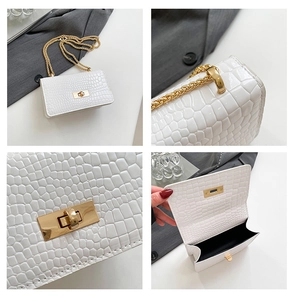 Detail shots of white crocodile pattern crossbody bag with gold hardware and chain strap