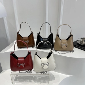 Chic crescent shoulder bags with bow accents and chain straps in five trendy spring colors