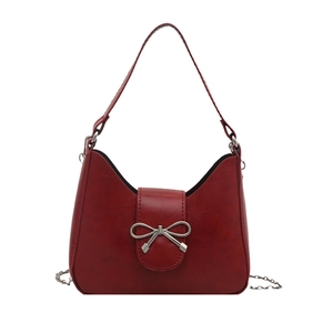 Elegant red PU leather crescent shoulder bag with bow metal detail and silver chain strap