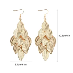 Long Bohemian gold leaf tassel earrings with detailed texture and size dimensions