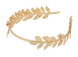 Detail of golden metal leaf headband with fine vein texture for bridal wedding hair