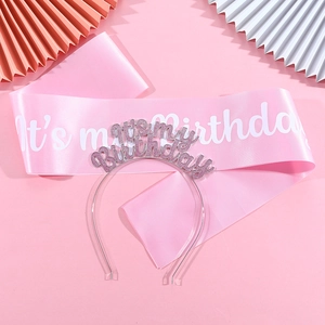 Detail of pink satin 'It's my birthday' sash and matching glitter headband set