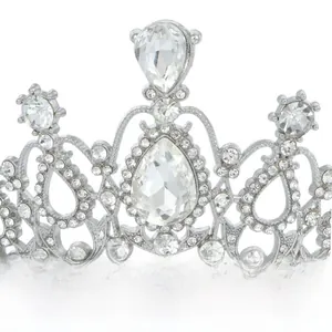 Macro detail of silver alloy crown with sparkling crystals and teardrop gems