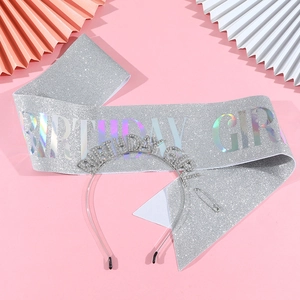 Silver Birthday Girl sash and rhinestone headband set with glitter detail on pink background
