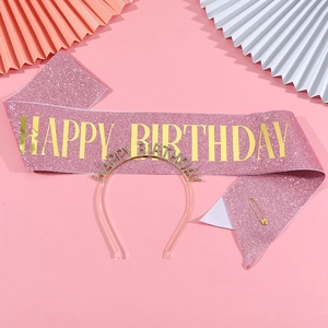Pink glitter Happy Birthday sash with gold lettering and rhinestone headband decoration