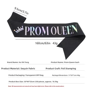 Detail showing the black glitter fabric texture and laser Prom Queen text with crown