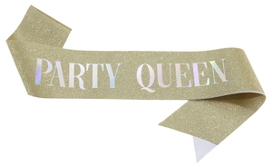 Macro shot of glittery gold sash with bold Party Queen lettering and shiny texture