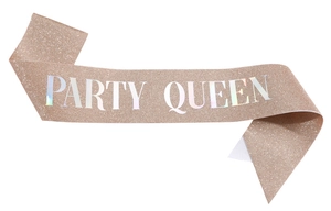 Close-up of rose gold glitter sash with silver iridescent Party Queen lettering