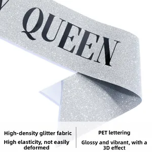 Detail of silver glitter fabric party sash with high elasticity and black Queen lettering
