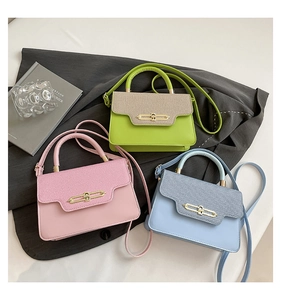 Chic textured crossbody bags in pink, green and blue with gold metal hardware