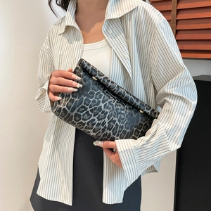 Elegant leopard print clutch bag with gold round metal clasp in grey and black pattern