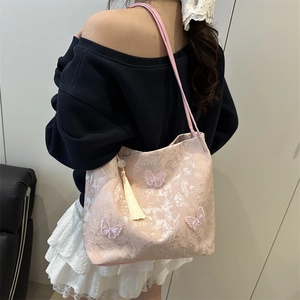 Pink butterfly embroidery tote bag with tassel and long shoulder straps for women