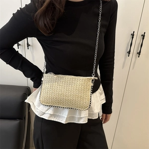 Fashionable beige woven chain bag for women with silver bead trim and metallic strap