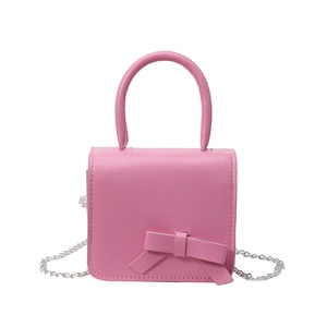 Pink mini crossbody bag with a cute bow detail and silver metal chain strap