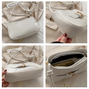 Detailed views of creamy white crossbody bag showing metal buckle and interior space