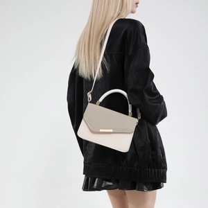 Minimalist color-block shoulder bag with grey flap and cream leather body for women
