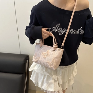 Borsa a tracolla in pizzo rosa con ricamo di farfalle 3D e tracolla regolabile