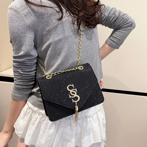 Fashionable black sequin crossbody bag with gold chain strap and tassel detail for women