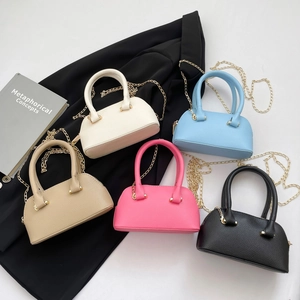 Minimalist litchi grain shell bags in five colors with gold chain straps and handles