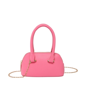Pink lychee texture mini handbag with golden chain strap and top handle in shell shape