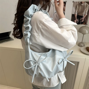Light blue ballet style ruched shoulder bag with cute decorative bows and cloud design