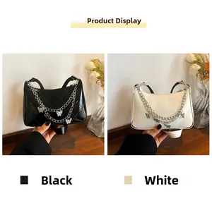 Detail of black and white quilted crossbody bags featuring butterfly chain straps