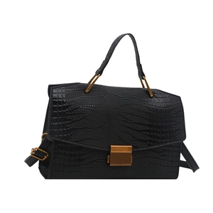 Large capacity black crossbody handbag with textured leather and vintage clasp detail